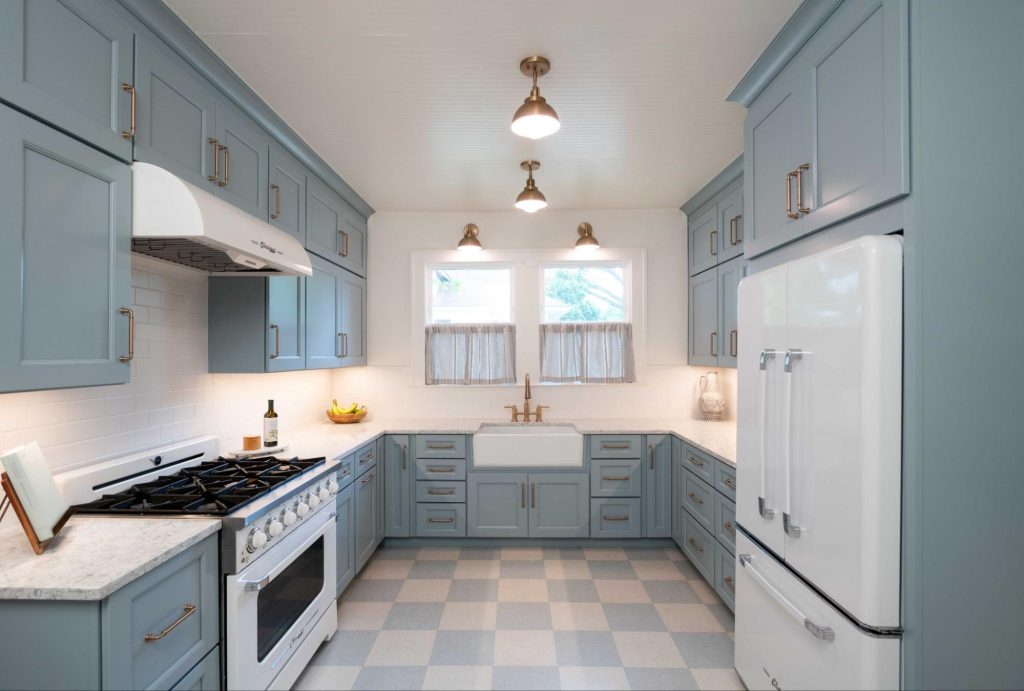 (blue retro kitchen, checkerboard floor): Custom cabinet design idea in a blue kitchen with retro style appliances and checkerboard floor, Kitchen Design Concepts Dallas kitchen
